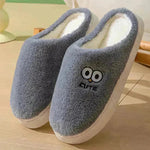 Lindas zapatillas de ojos grandes de dibujos animados para parejas de invierno calientes calientes sin desliz