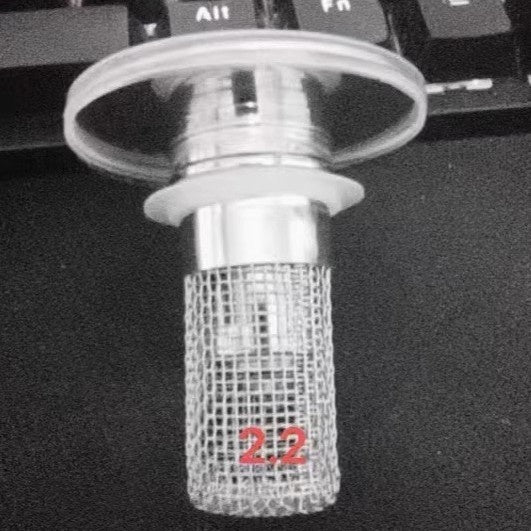 Metal mesh filter with a circular top and '2.2' marking on a black background