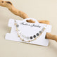 Bracelet on a 'Fashion Jewelry' card with a natural wood background