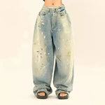 Jeans holgados de piernas anchas y desgastadas desgastadas