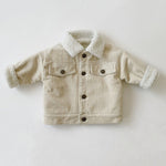 Beige corduroy jacket with sherpa lining on a white background