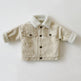 Beige corduroy jacket with sherpa lining on a white background