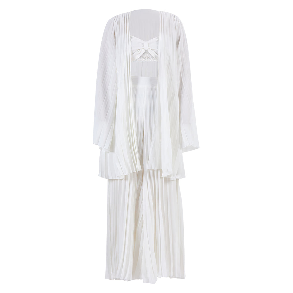 White pleated dress with a bow detail on a white background