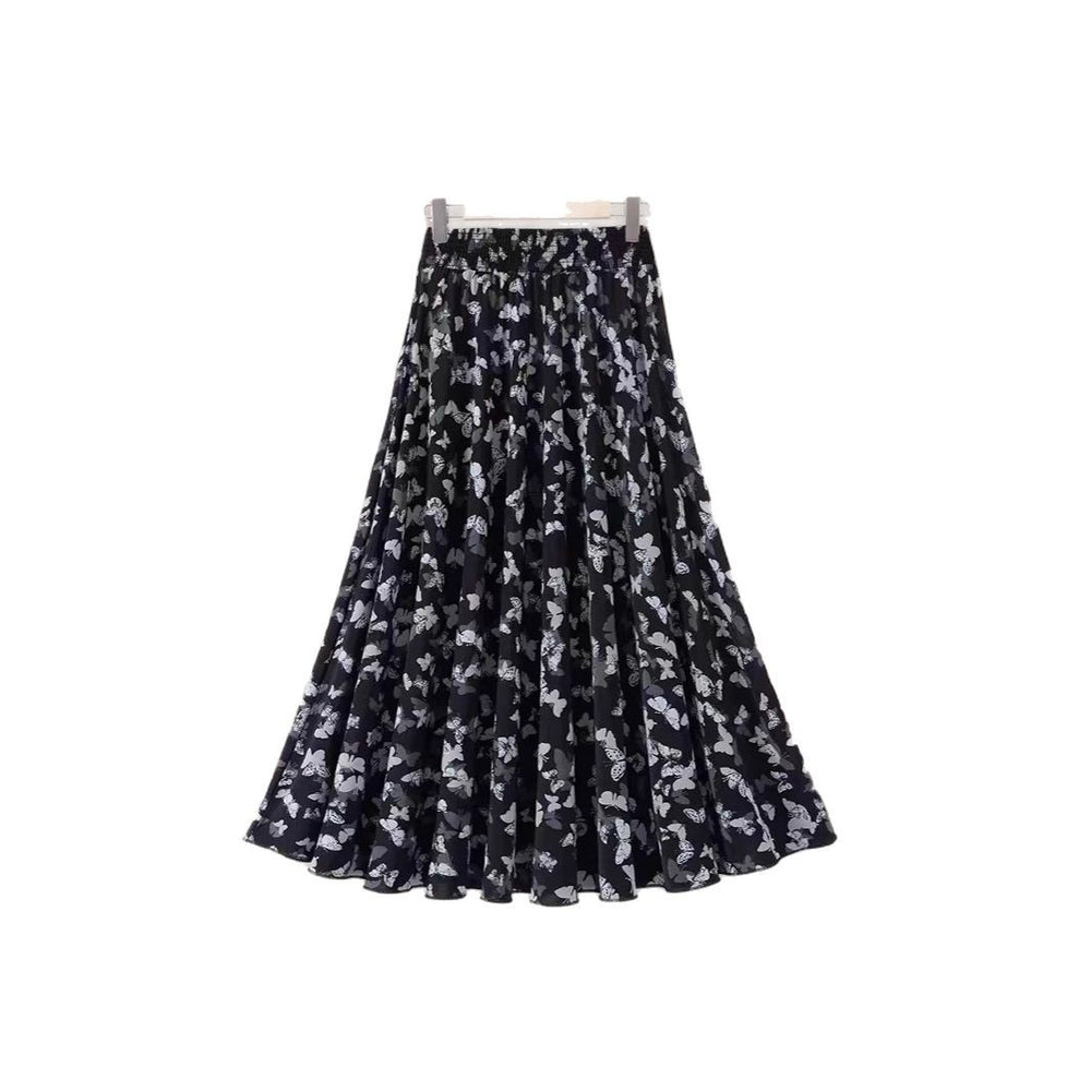 Black floral patterned skirt on a white background