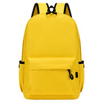 Yellow backpack with black straps on a white background