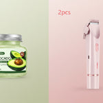 Avocado bath salt scrub jar and pink hair trimmer on a white background