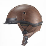 Brown leather helmet with black straps on a white background
