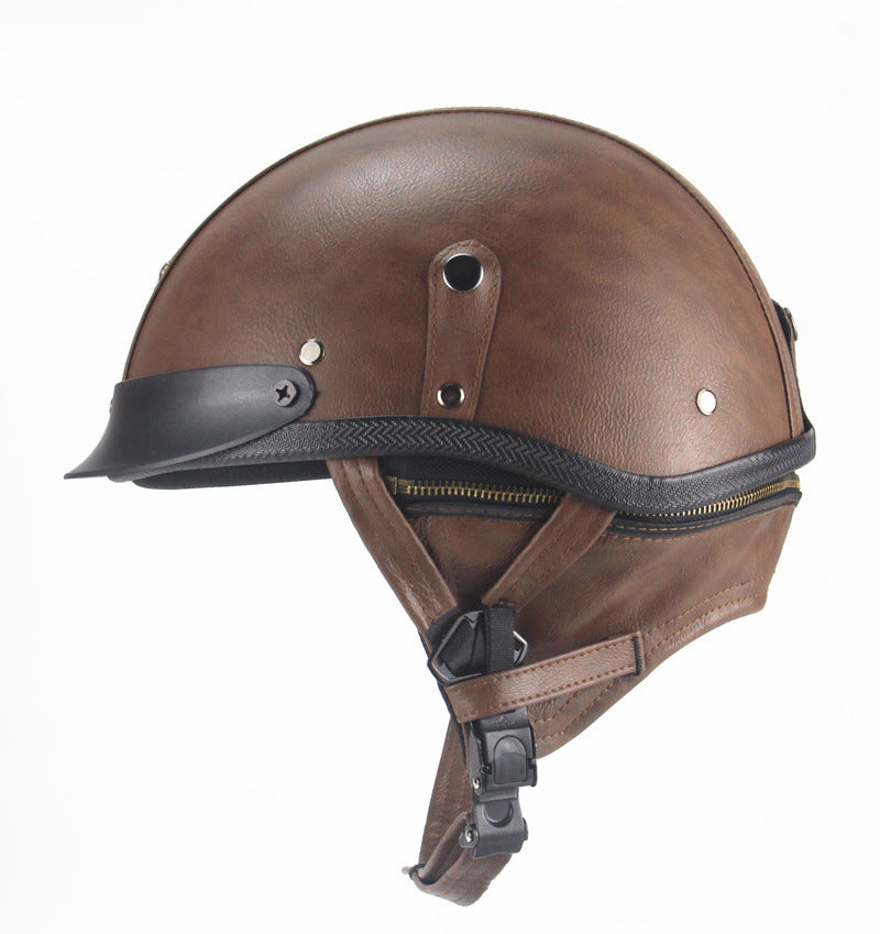 Brown leather helmet with black straps on a white background
