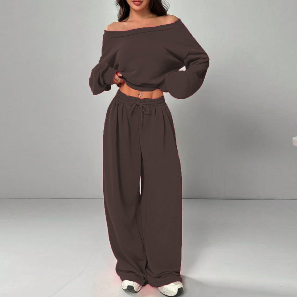 Brown off-shoulder top and wide-leg pants set on a gray background