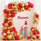 Balloon arch with red and gold balloons and a cake on a stand.