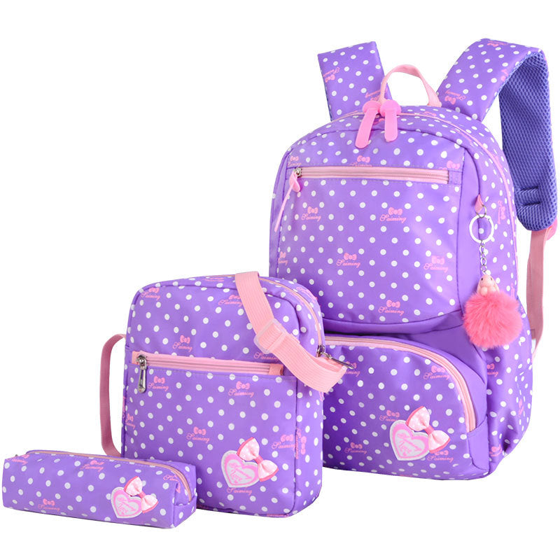 Purple polka dot backpack with pink accents and a matching pouch on a white background