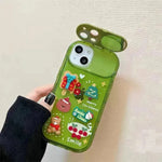 Caso protector de iPhone de silicona con temas de Navidad con chicas colgantes