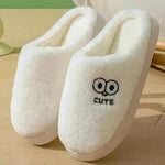 Lindas zapatillas de ojos grandes de dibujos animados para parejas de invierno calientes calientes sin desliz