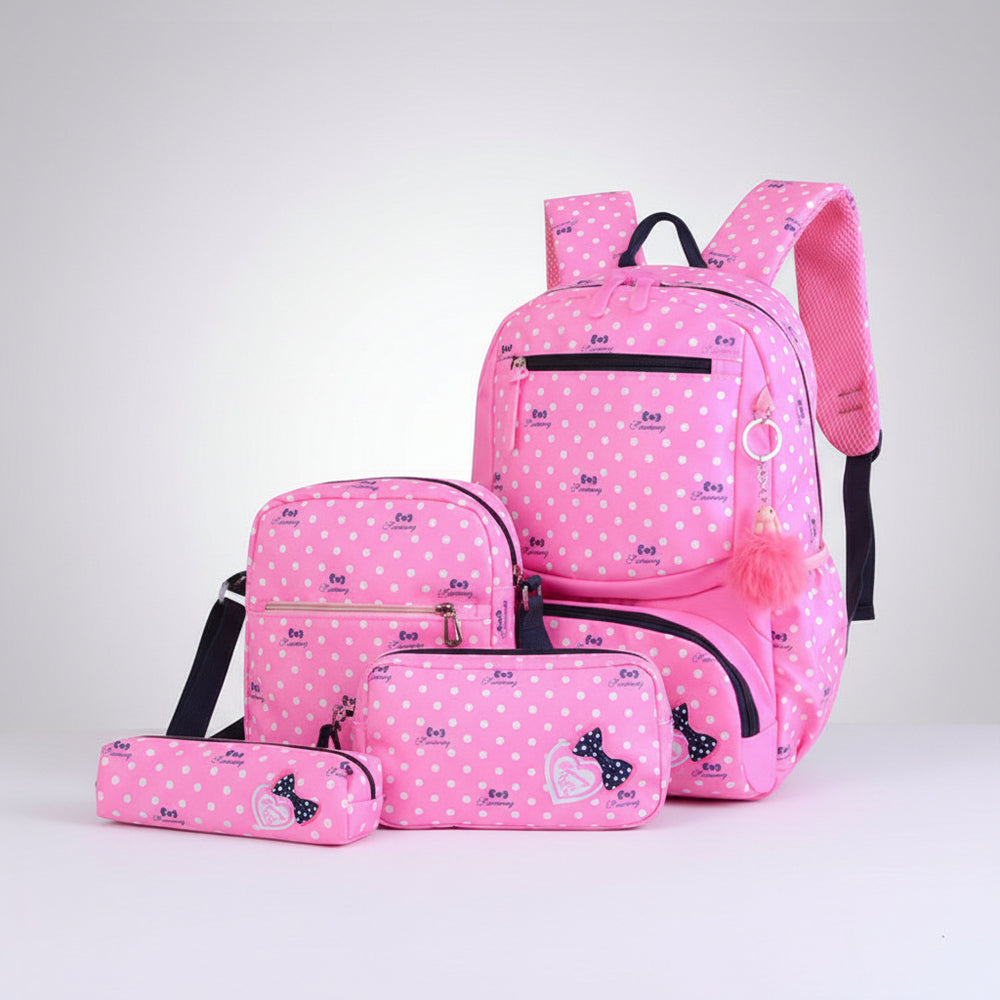 Pink polka dot backpack and pouch set against a blue sky with clouds and hot air balloons.