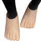 A pair of beige, foot-shaped shoe covers with textured, raised patterns resembling skin creases, shown worn on feet with black socks against a white background.