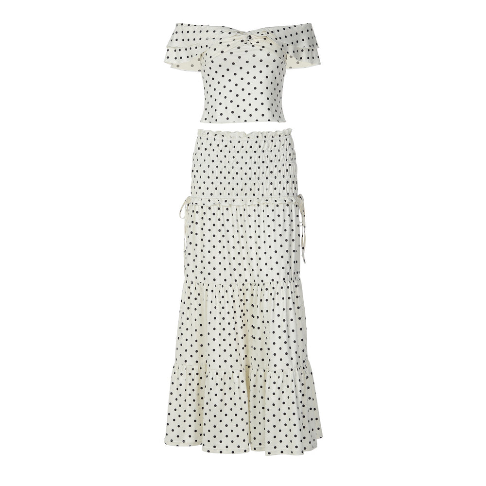 Polka dot off-shoulder top and skirt set on a white background