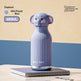 Elephant-shaped water bottle with purple color on a beige and blue background