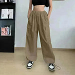 Pantalones de carga holgados rectos de la pierna de pierna ancha de las mujeres.