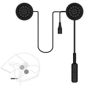 Black motorcycle helmet sound system with two round speaker covers, a connecting cable, a USB charging connector, and a handheld controller, shown on a white background with a small line drawing of the helmet.