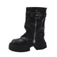 Black leather boot with buckle and zipper on a white background